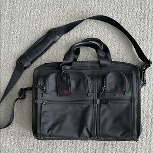 Tumi Black Briefcase with Durable Nylon and Adjustable Strap